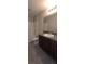 A bathroom complete with shower and tub, granite countertop and a modern sink at 2216 4Th Sw St, Ruskin, FL 33570