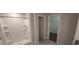 Bathroom featuring a shower and view to walk-in closet at 2216 4Th Sw St, Ruskin, FL 33570