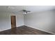 Spacious bedroom featuring luxury vinyl plank flooring and a ceiling fan at 2216 4Th Sw St, Ruskin, FL 33570