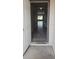 Inviting entryway featuring tile flooring and views of the living area with natural light at 2216 4Th Sw St, Ruskin, FL 33570