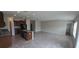 Open-concept living space with tile floors connecting kitchen to living area at 2216 4Th Sw St, Ruskin, FL 33570