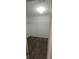 Walk-in closet features vinyl plank flooring and shelving at 2216 4Th Sw St, Ruskin, FL 33570