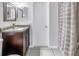 Bathroom with granite vanity and shower at 2270 Amherst Ave, Spring Hill, FL 34609