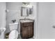 Bathroom with granite vanity and tiled floor at 2270 Amherst Ave, Spring Hill, FL 34609