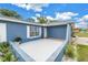 Large front porch, showcasing a neutral color scheme and an open space for relaxation at 2270 Amherst Ave, Spring Hill, FL 34609
