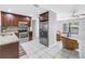 Modern kitchen with granite countertops, stainless steel appliances, and tile flooring at 2270 Amherst Ave, Spring Hill, FL 34609