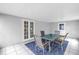 Covered patio with tile floor and table at 2270 Amherst Ave, Spring Hill, FL 34609