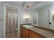 Bathroom featuring a single vanity and a shower with a curtain in the background at 2279 Ranchette Ln, Dunedin, FL 34698