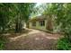 This two-story home sits on a wooded lot offering privacy and space at 2279 Ranchette Ln, Dunedin, FL 34698