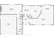 First floor floorplan featuring kitchen, garage, bathrooms, living room and dining room at 2279 Ranchette Ln, Dunedin, FL 34698