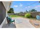 Spacious backyard featuring a patio seating area and cozy fire pit, perfect for relaxation and entertaining in a private setting at 2701 65Th Ave S, St Petersburg, FL 33712