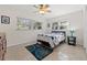 Cozy bedroom with natural light, ceiling fan, and neutral decor at 2701 65Th Ave S, St Petersburg, FL 33712