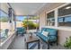 Relaxing enclosed porch with comfortable seating and a view of the outdoors at 2701 65Th Ave S, St Petersburg, FL 33712