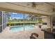 Relaxing screened-in pool with spacious patio area and lush landscaping at 2713 Brianholly Dr, Valrico, FL 33596