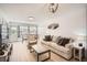 Bright living area with comfortable seating, dining area, and tiled floors at 28 Seaside Ct, Holmes Beach, FL 34217