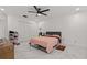 Bright bedroom with a ceiling fan, a double bed, and ample closet space at 3104 Apricot St, Seffner, FL 33584