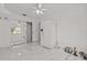 Bright room with a closet, white appliances, and a ceiling fan at 3104 Apricot St, Seffner, FL 33584