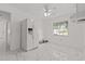 Bright room with white appliances and a window for natural light at 3104 Apricot St, Seffner, FL 33584