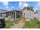 Large backyard with a shed and screened-in porch for enjoying the outdoors and storage at 3104 Apricot St, Seffner, FL 33584