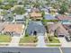 A stunning aerial view of the home highlighting the well-maintained landscaping and surrounding neighborhood at 332 Wood Dove Ave, Tarpon Springs, FL 34689