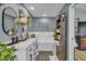Stylish bathroom featuring a soaking tub, double vanity, modern fixtures, and elegant decor at 332 Wood Dove Ave, Tarpon Springs, FL 34689