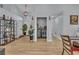 Open laundry area with new front-loading washer and dryer units tucked behind bifold doors at 332 Wood Dove Ave, Tarpon Springs, FL 34689
