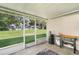 Outdoor patio area with views of the backyard and grilling equipment at 35229 Janine Dr, Zephyrhills, FL 33541