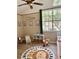 Bright Bedroom featuring a large window, neutral walls, and -friendly decor at 3615 Pine Knot Dr, Valrico, FL 33596