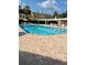 Inviting community pool with ample lounge chairs and well-maintained surrounding area at 3615 Pine Knot Dr, Valrico, FL 33596