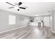 Spacious living room with gray walls and vinyl flooring at 37230 Poinsettia Ave, Dade City, FL 33525