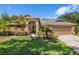 Charming single-story brick home with a well-manicured lawn, beautiful trees, and a two-car garage at 3922 Cedar Cay Circle, Valrico, FL 33596