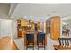 Spacious kitchen features granite countertops, stainless steel appliances and a center island with bar seating at 3922 Cedar Cay Circle, Valrico, FL 33596