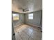 Cozy bedroom featuring tile flooring at 3950 45Th N Ave, St Petersburg, FL 33714