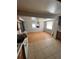 A dining room featuring hardwood floors and natural light from the windows at 3950 45Th N Ave, St Petersburg, FL 33714