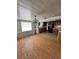 Dining and Kitchen combination featuring hardwood and tile flooring at 3950 45Th N Ave, St Petersburg, FL 33714