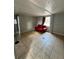 Living room with tile flooring and a large window at 3950 45Th N Ave, St Petersburg, FL 33714