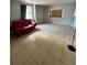 Cozy living room with red sofa and tile flooring at 3950 45Th N Ave, St Petersburg, FL 33714