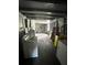 Utility room showcasing laundry area, storage space, and access to additional areas at 3950 45Th N Ave, St Petersburg, FL 33714