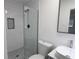 Modern bathroom featuring subway tile shower, a black tiled inset, and a vessel sink at 4105 W Oakellar Ave, Tampa, FL 33611