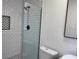 Modern shower featuring subway tile, and a black tiled inset at 4105 W Oakellar Ave, Tampa, FL 33611