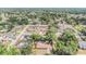 Spacious neighborhood featuring single-Gathering homes with mature trees and landscaped yards, providing a serene residential setting at 414 Cactus Cir, Seffner, FL 33584