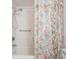 Bathroom with a floral curtain at 414 Cactus Cir, Seffner, FL 33584