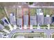 Aerial view of a neighborhood featuring a home with a large backyard, playset and tidy landscaping at 4507 Eternal Prince Dr, Sun City Center, FL 33573
