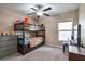Bedroom with bunkbeds, dresser and window allowing for natural light to enter at 4507 Eternal Prince Dr, Sun City Center, FL 33573