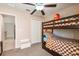 Bedroom with bunkbeds, closet and a view into the hallway at 4507 Eternal Prince Dr, Sun City Center, FL 33573