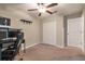 Bedroom with ceiling fan, closet and computer desk at 4507 Eternal Prince Dr, Sun City Center, FL 33573