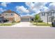 Charming single-Gathering home featuring a two-car garage and well-manicured front lawn on a sunny day at 4507 Eternal Prince Dr, Sun City Center, FL 33573