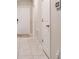 Hallway featuring tile floors and neutral paint at 4507 Eternal Prince Dr, Sun City Center, FL 33573
