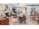 Bright and inviting living room with a fireplace, plush seating, and a view into the kitchen at 4509 S Cortez Ave, Tampa, FL 33611