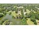 From above, the property's pond and barn are visible inside a defined boundary at 4706 Scott Rd, Lutz, FL 33558